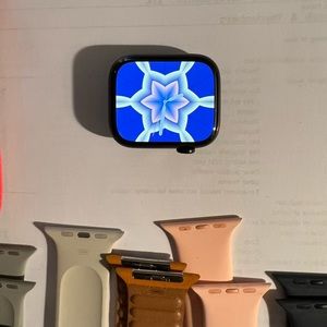 Apple Watch Series 7 with apple bands.  45 mm titanium no visible flaws chips